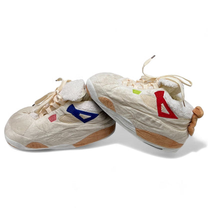 An overhead view of the slippers showcasing their plush foam interior, highlighting the ultimate comfort they provide. The slippers are styled with a neutral background to enhance their elegance.