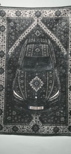 Dark car rug displayed as wall art